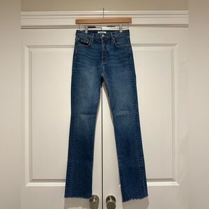 GRLFRND high rise, split hem, button fly, stretch jean; size 27